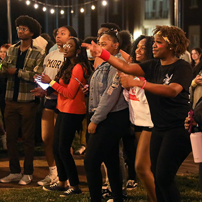 Emory students at a night event on Oxford's quad